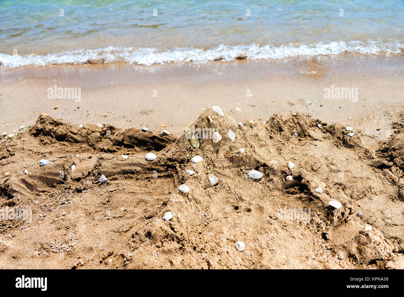 little boy in blue sea Stock Photo