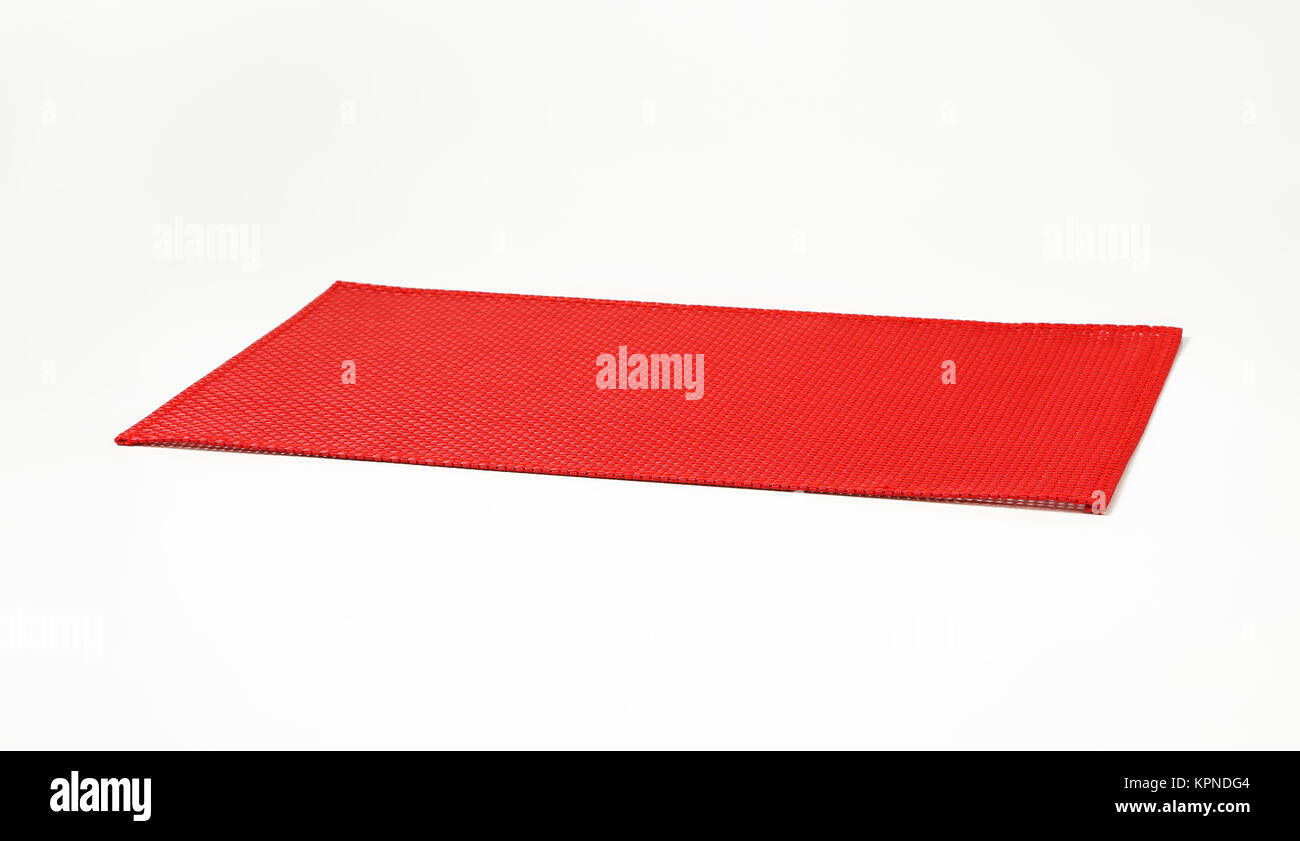 Red plastic placemat Stock Photo Alamy
