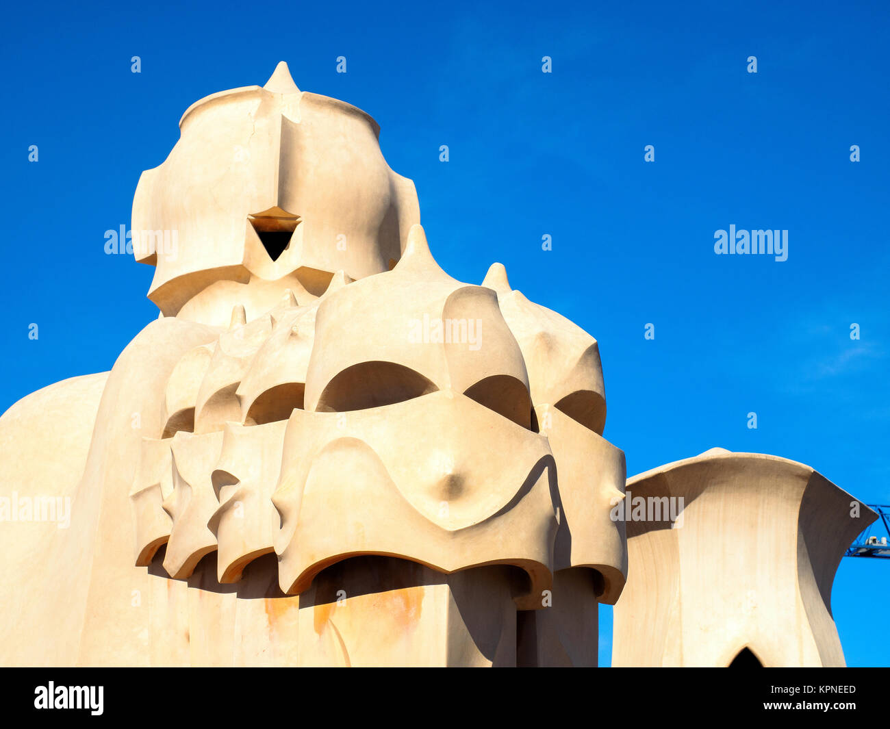 Rooftop chimneys on Casa Milà known as La Pedrera, designed by Catalan architect Antoni Gaudi - Barcelona, Spain. Stock Photo