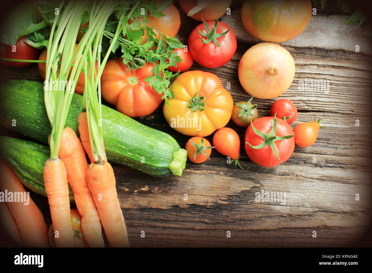 Fresh vegetables on wooden background Stock Photo - Alamy