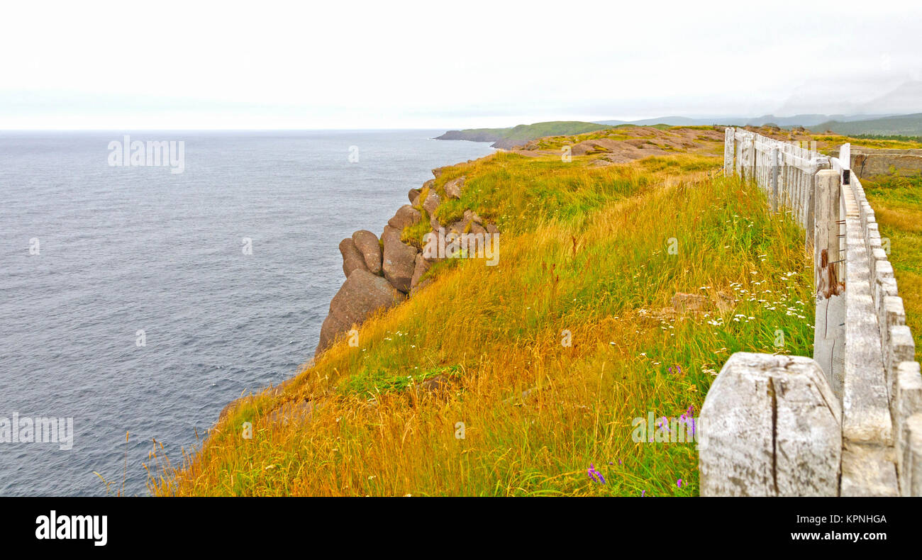 Clouds and Colors on a Coastal Cliff Stock Photo