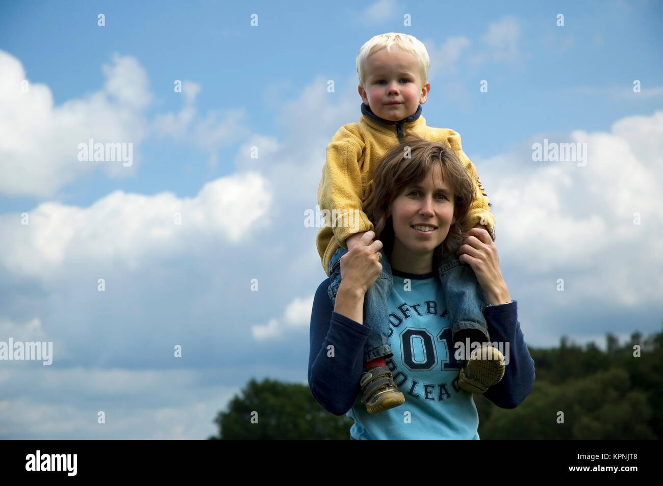Mother And Son Walking Stock Photo
