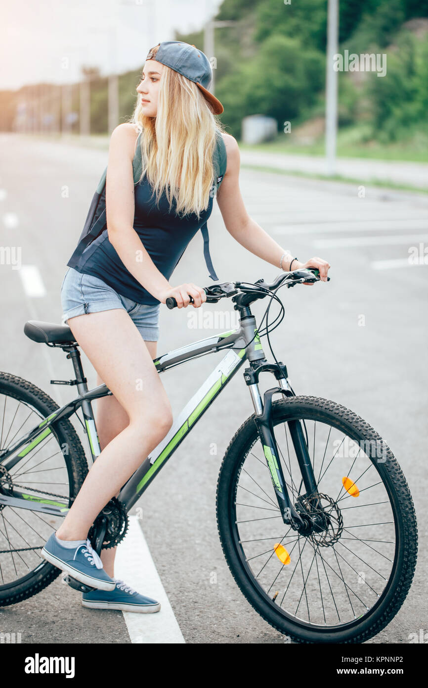 girl with bicycle