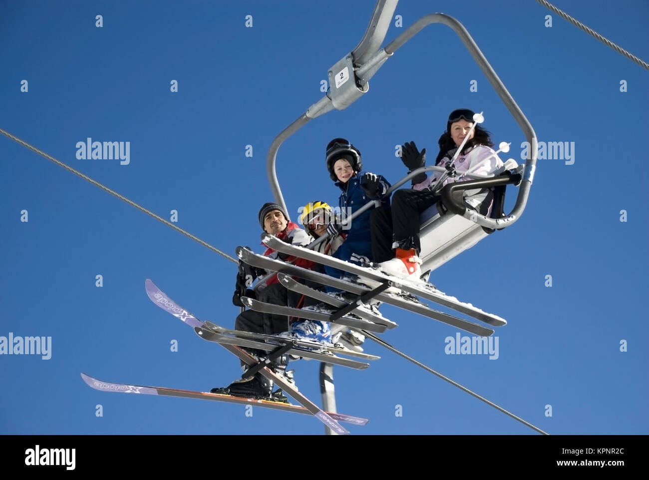 Skifahrer am Sessellift - skier on chair lift Stock Photo