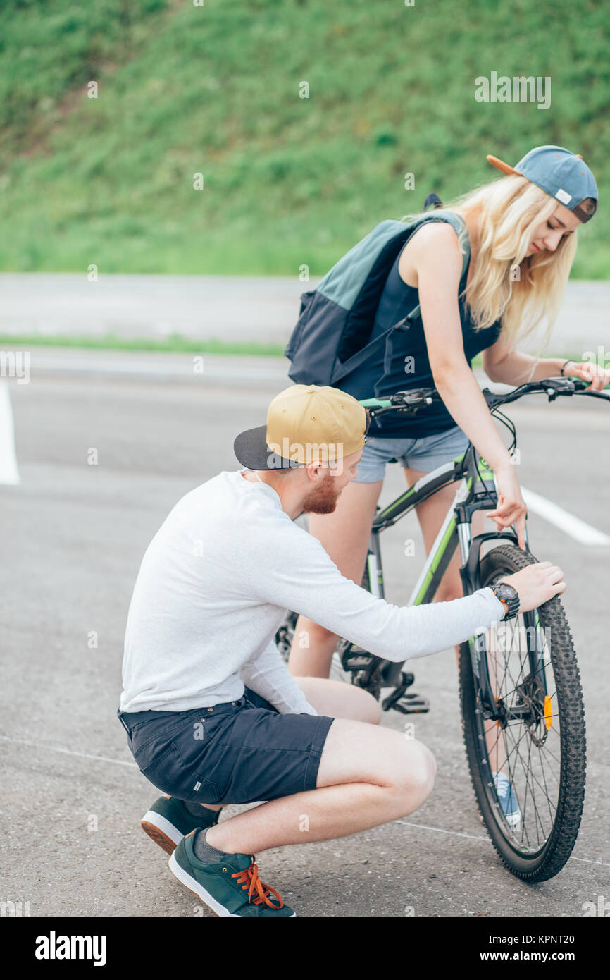 Young mechanic fixing brake hi-res stock photography and images - Alamy