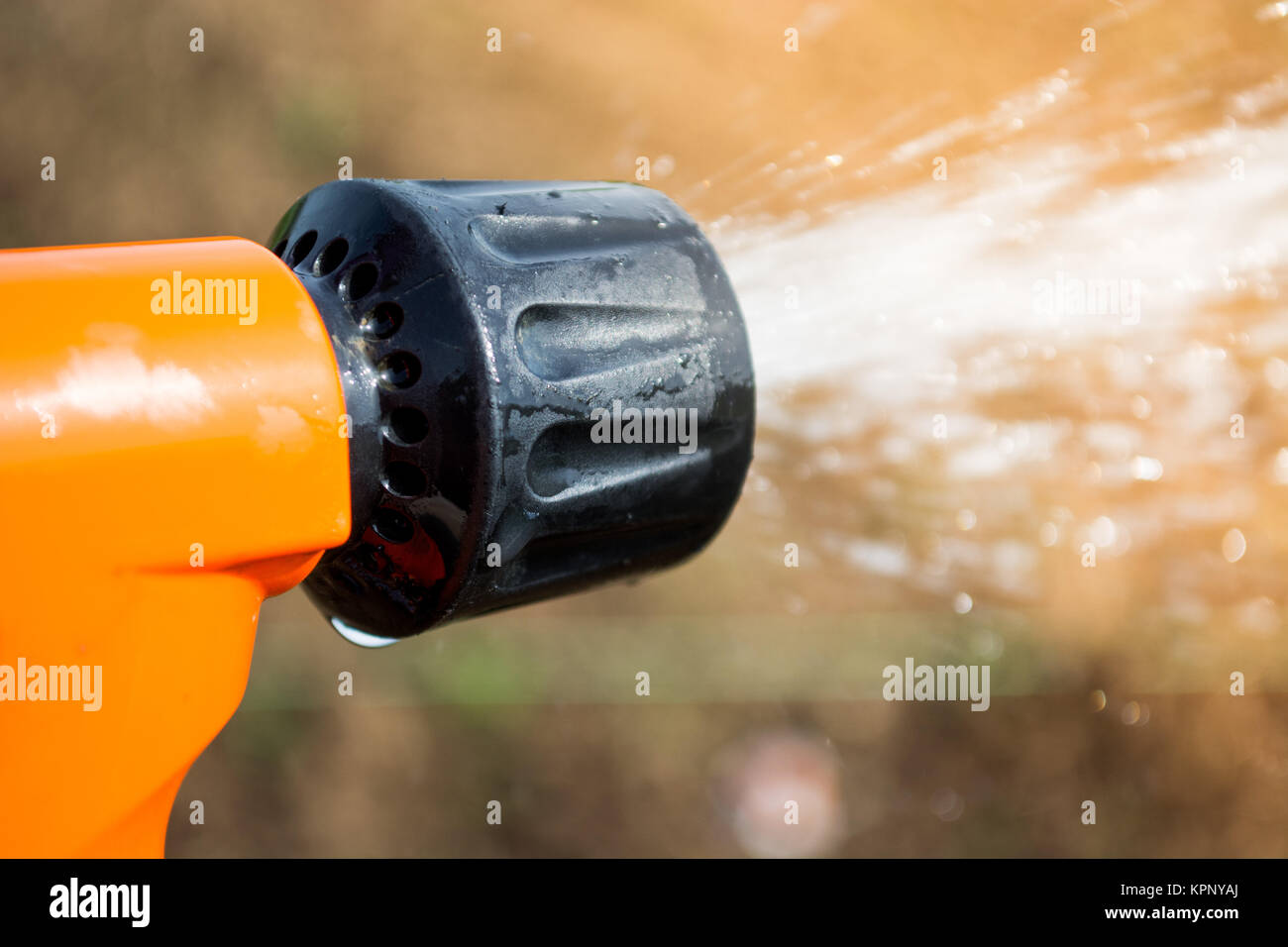 Closeup of hand held sprinkler Stock Photo Alamy
