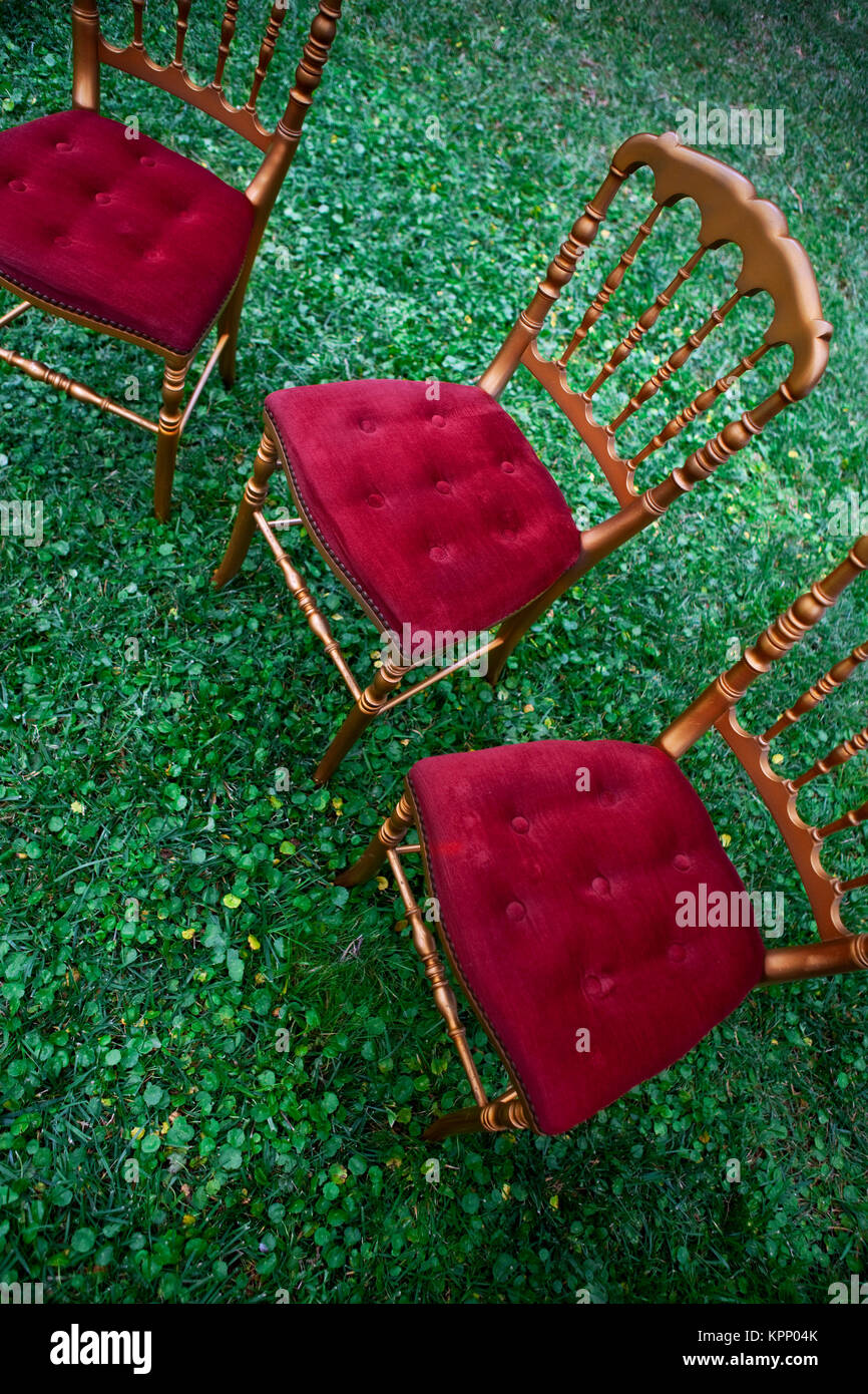Stylish chairs on grass Stock Photo Alamy