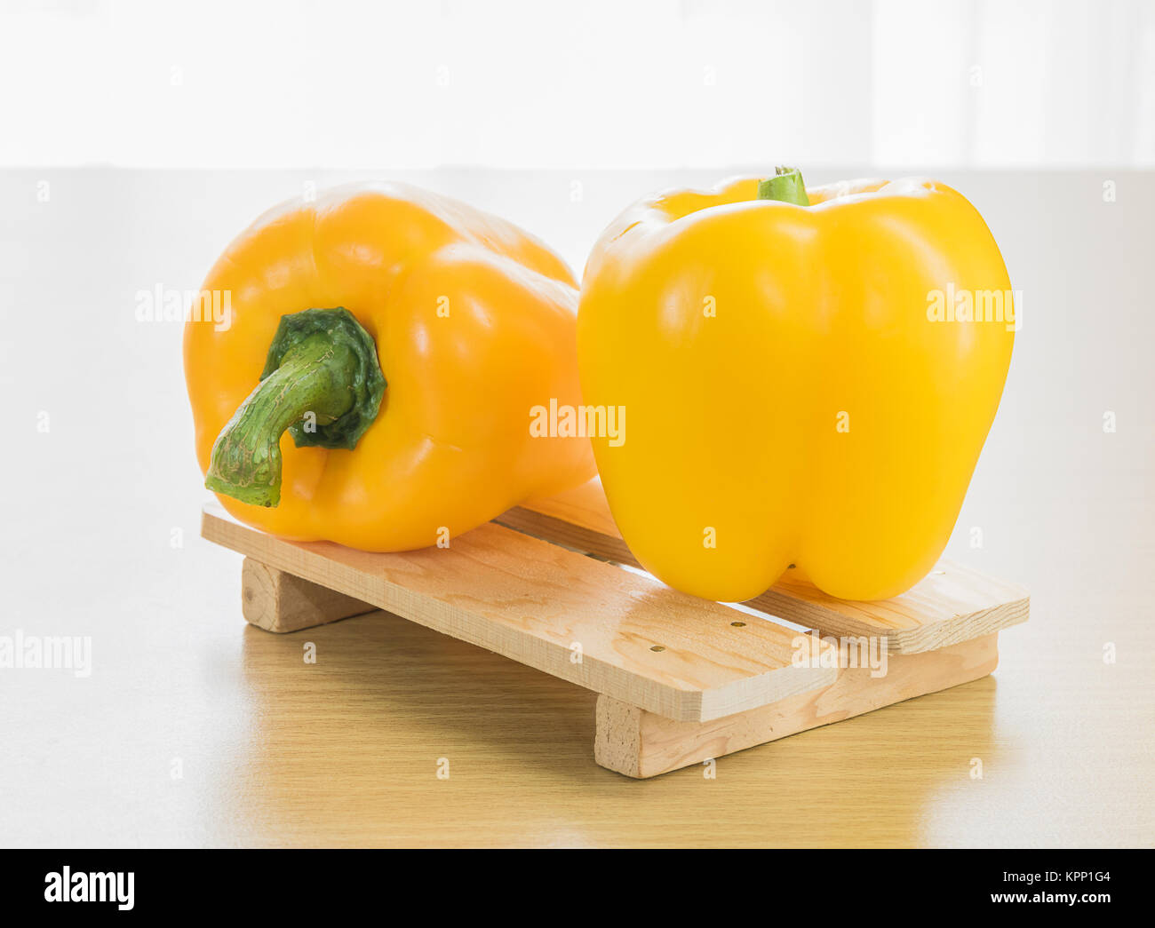 Bell peppers wood tray Stock Photo - Alamy