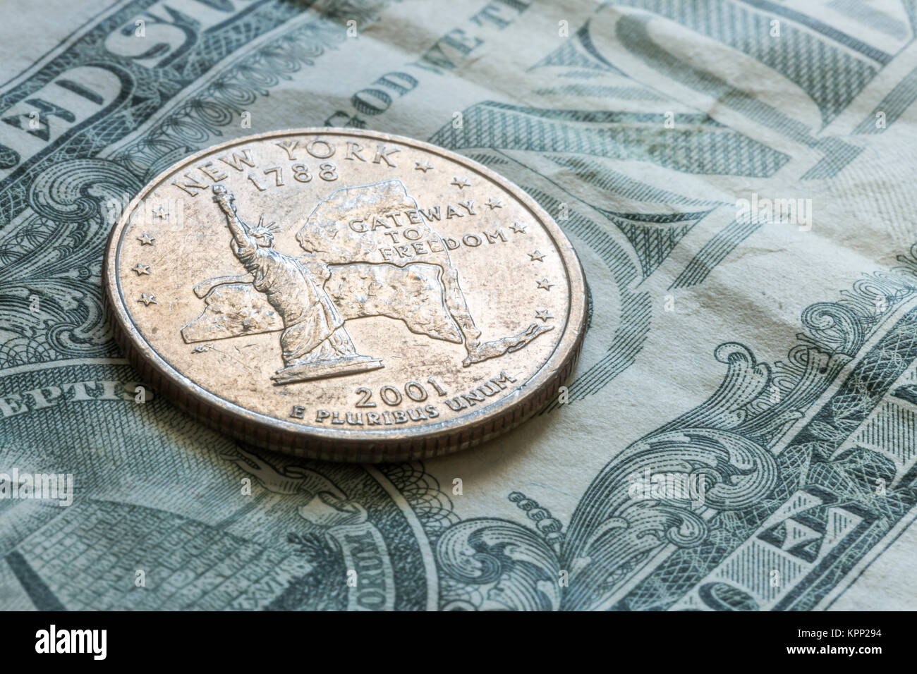 US New York Quarter on One Dollar Bill Stock Photo Alamy