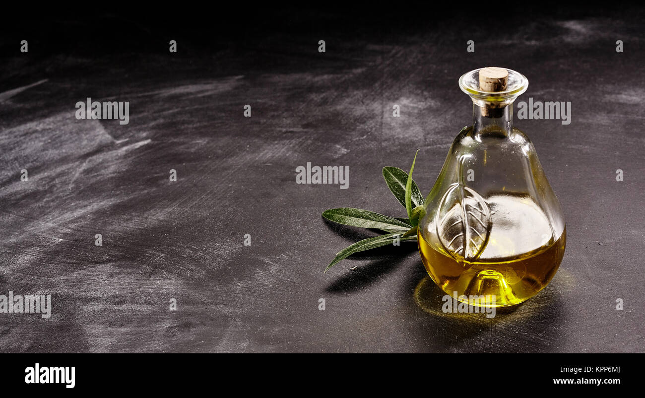 Close Up Still Life Of Small Decorative Glass Bottle Of Olive Oil