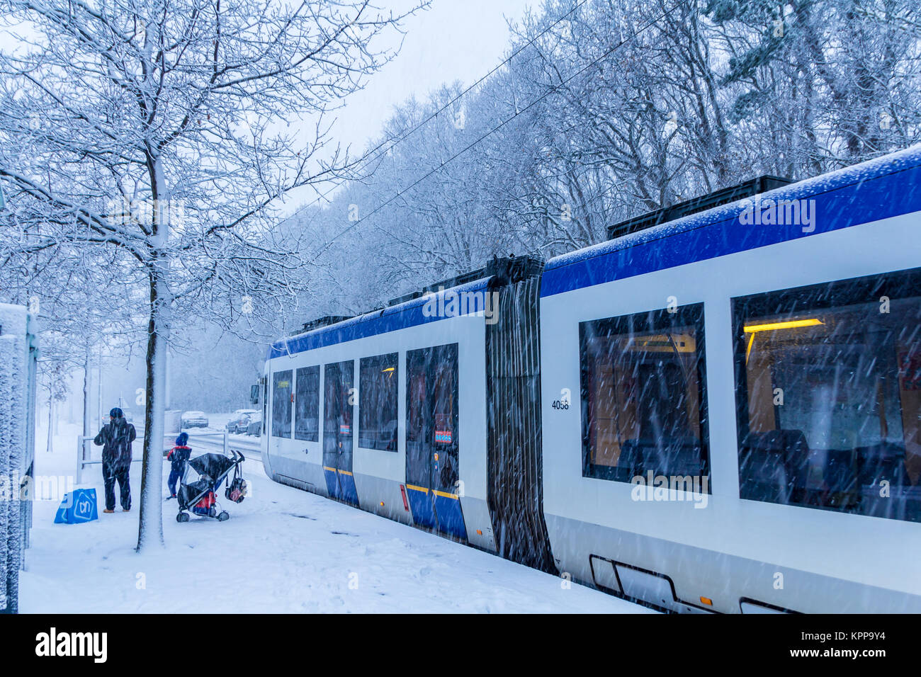 The Hague, the Netherlands - December 11, 2017: snow covered tram at Loosduinen, The Hague Stock Photo