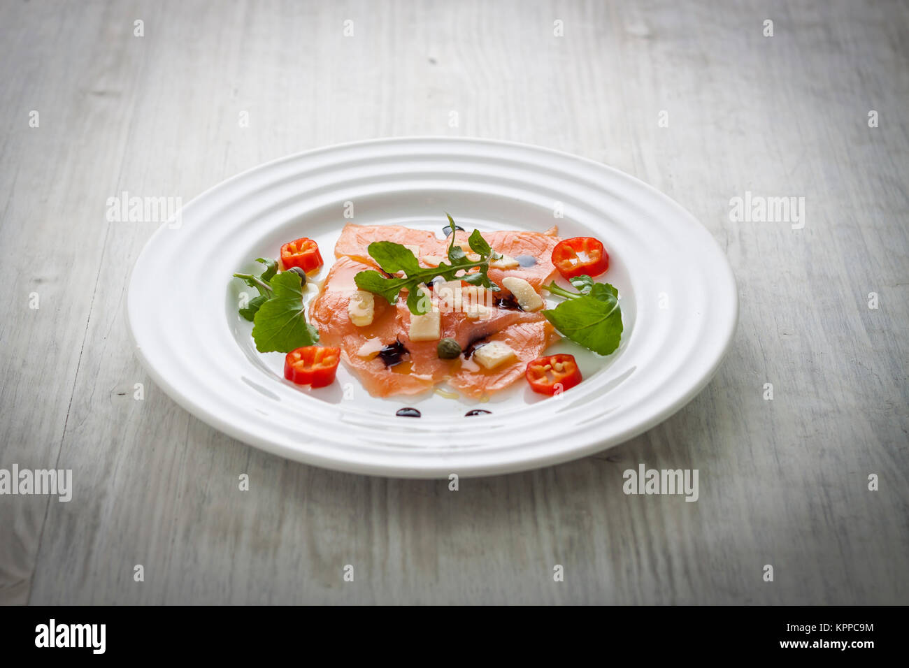 Salmon carpaccio on plate Stock Photo Alamy