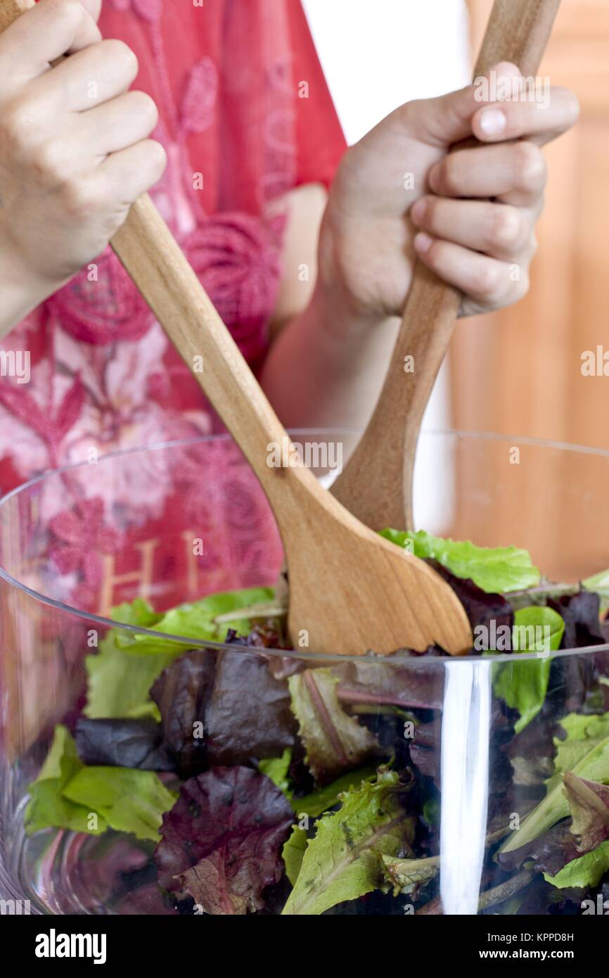 hand mixing salad Stock Photo Alamy
