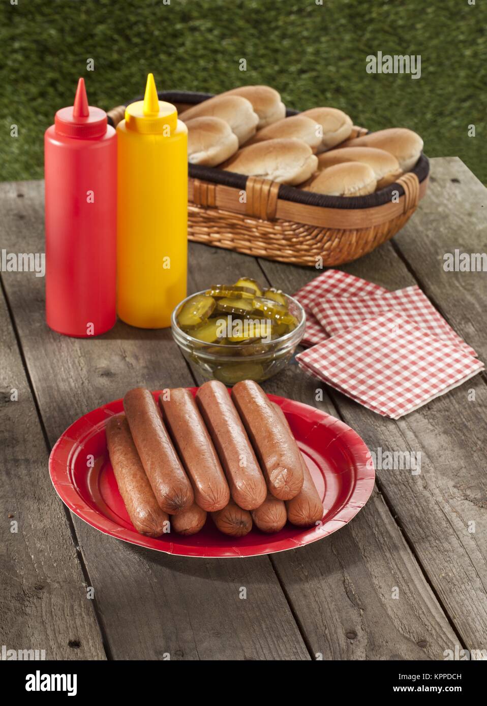 hot dogs buns and condiments Stock Photo