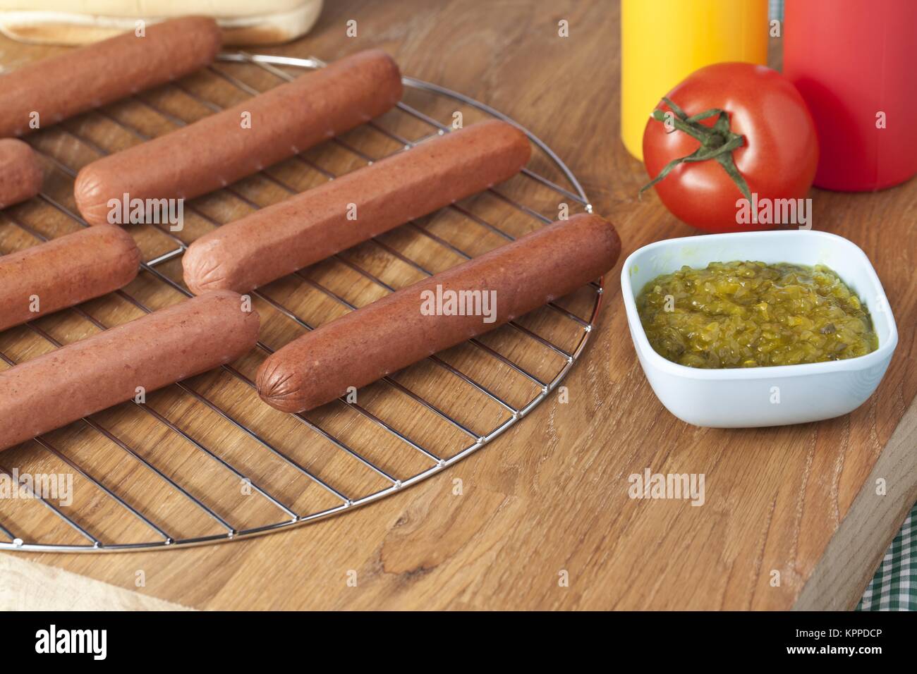 hot dogs pickles and tomato Stock Photo