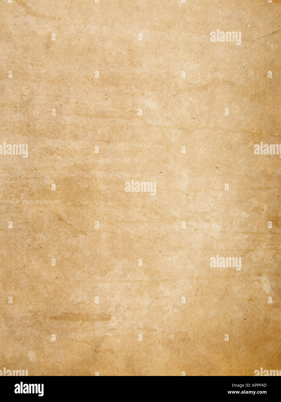 Old dirty paper backdrop for the design. Natural old paper texture. Stock Photo