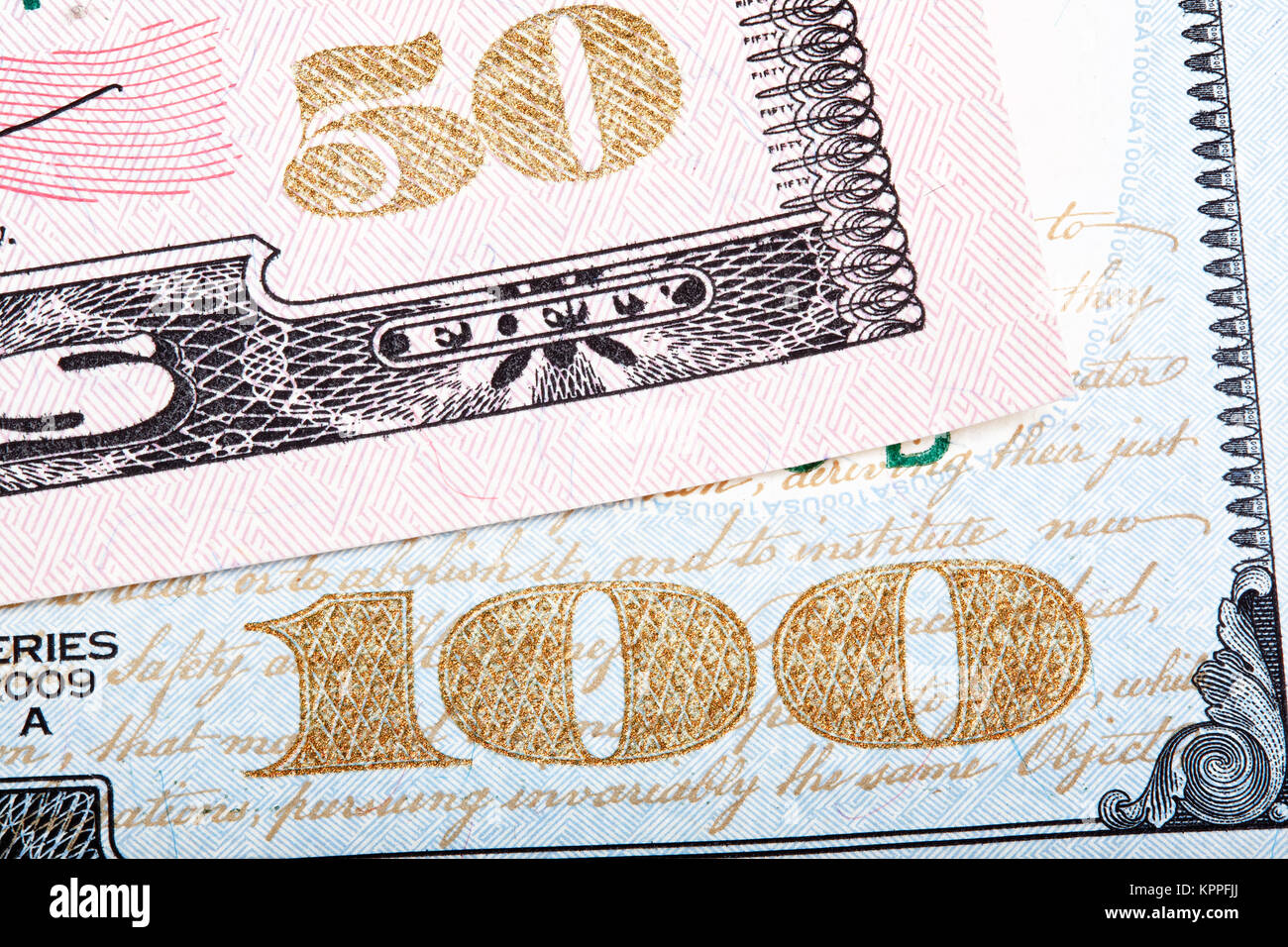 Stacked photo. Detail of new design of 100 and 50 dollars. Stock Photo
