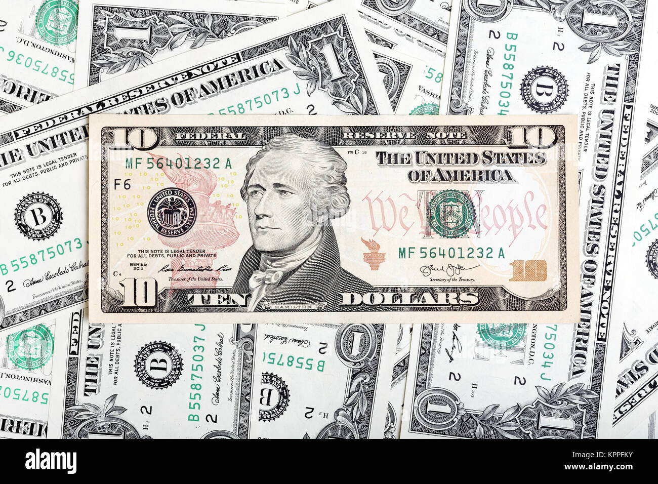One Dollar Banknotes And Ten Dollar Bill Background Stock Photo