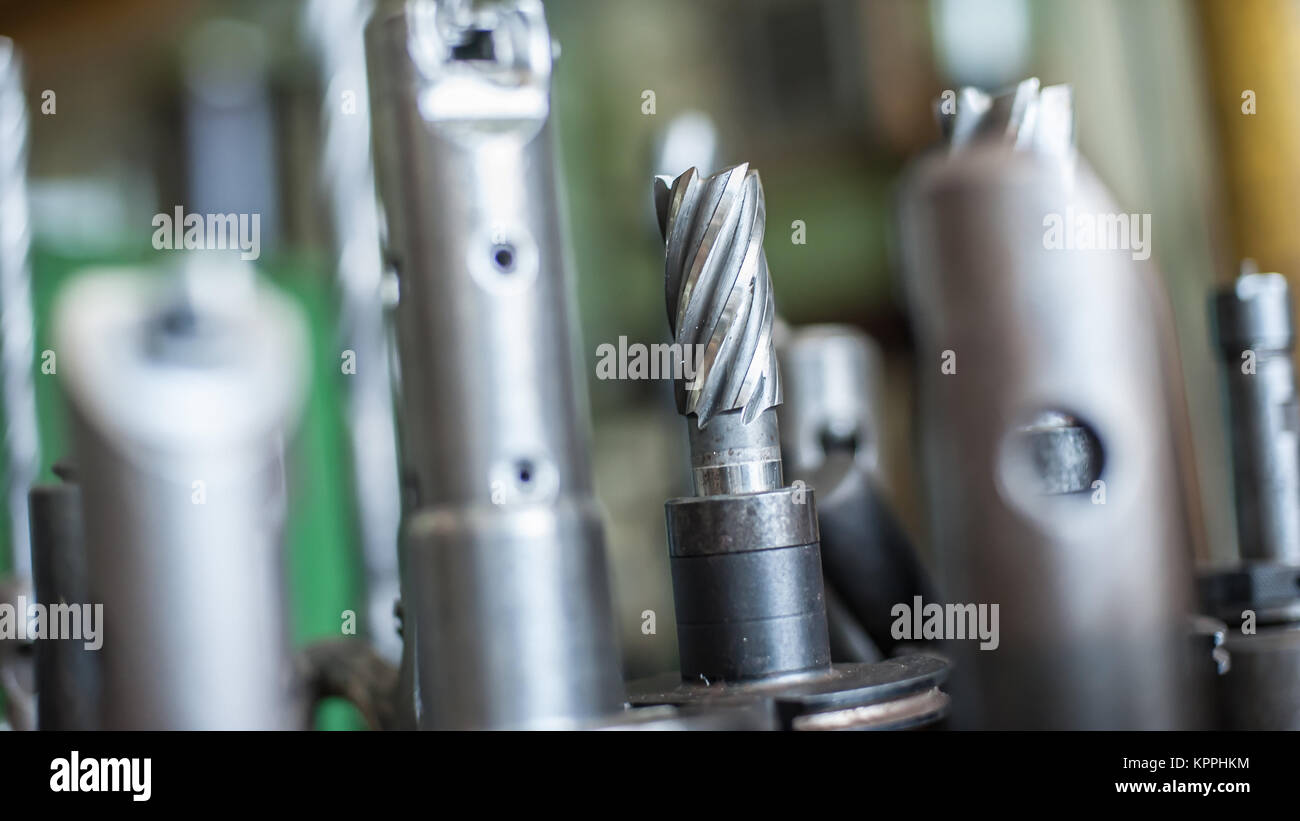 Heavy industrial drill bits at the factory Stock Photo Alamy