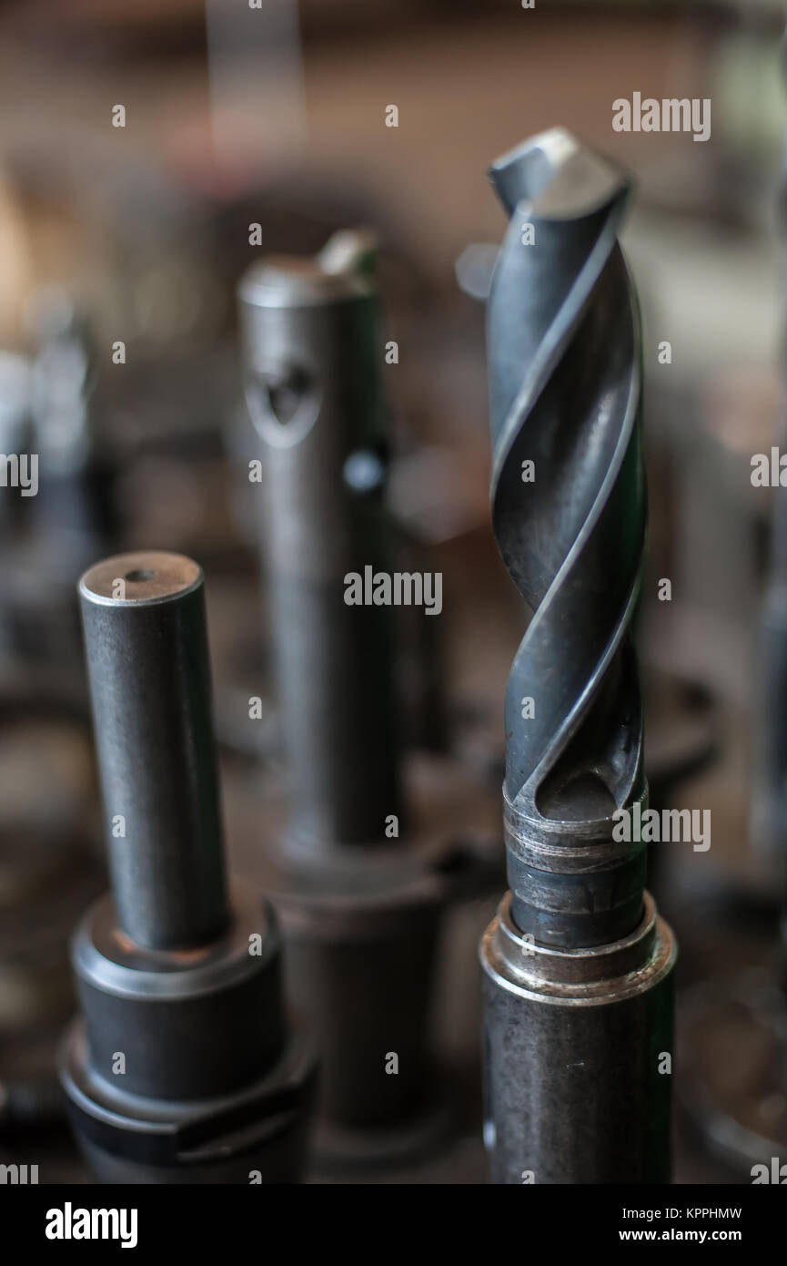 Heavy industrial drill bits at the factory Stock Photo Alamy