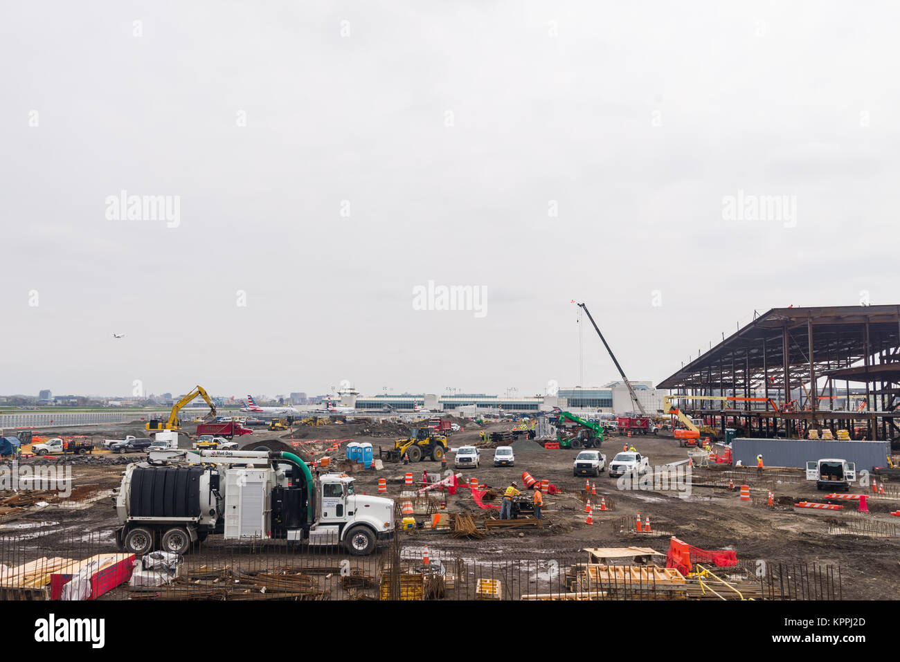 Construction equipment and workers building the new terminal at La Guardia airport in Queens, New York, USA Stock Photo