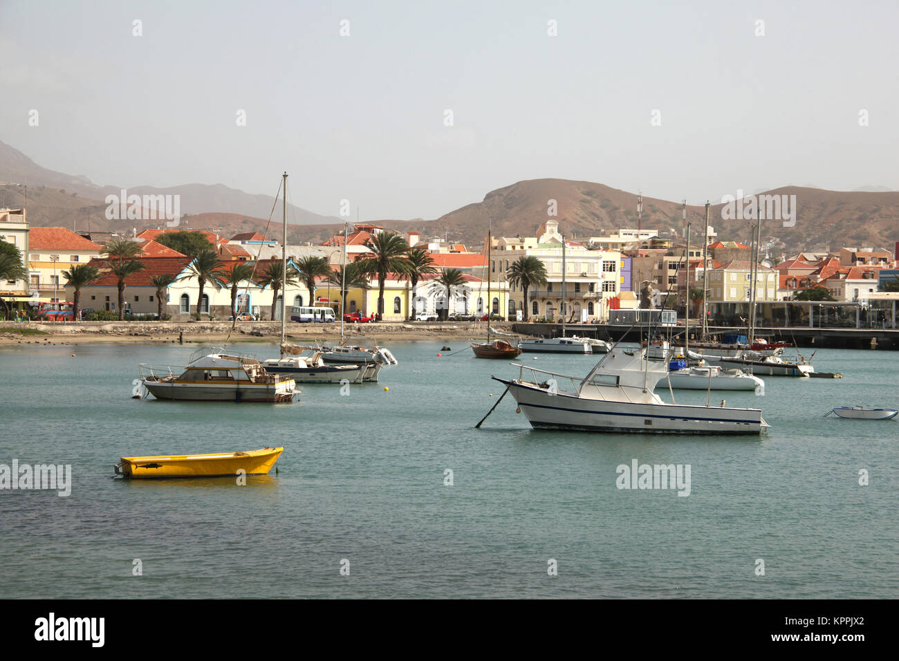 Harbor with fishing boats & the water front of Mindelo on Sao Vicente Island, Cape Verde Islands, Atlantic. Stock Photo
