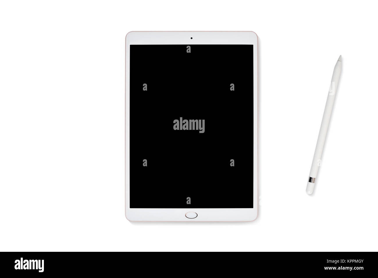Mockup tablet computer and pencil isolated on white background, flatlay on a white wooden background, with place for your text. Flat lay, top view photo mock up Stock Photo