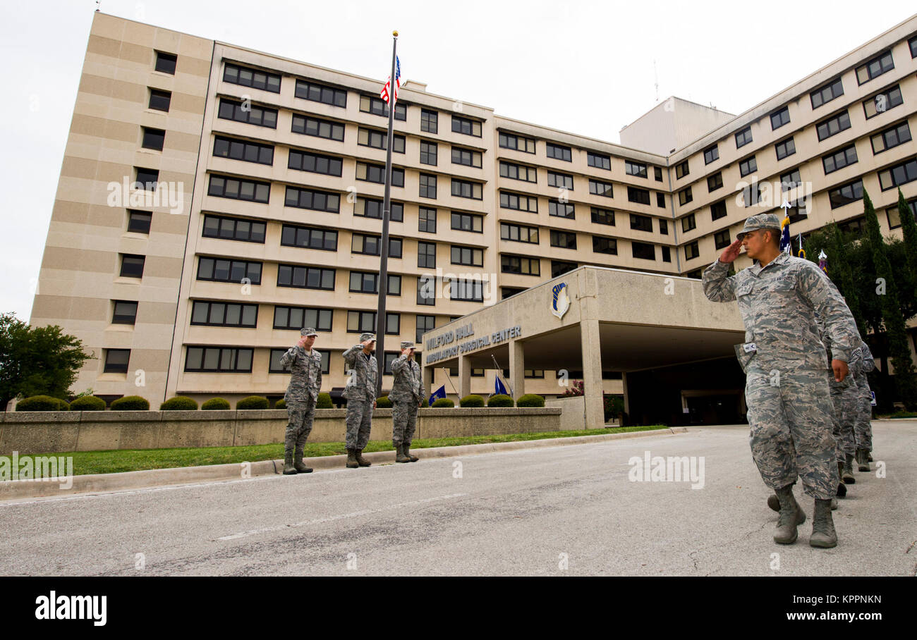 Senior leadership from the 59th Medical Wing render a salute for a pass