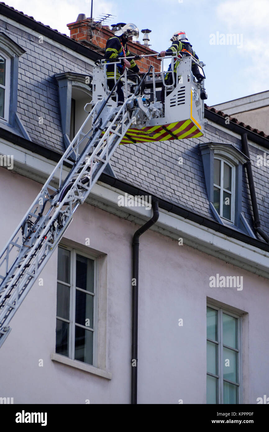 Firemen take part to rescue operation, Lyon, France Stock Photo - Alamy