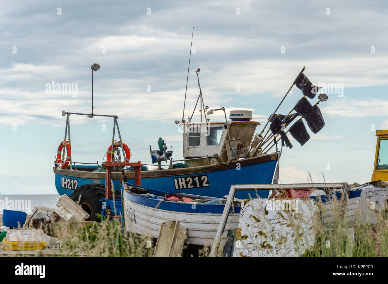 Collection of fishing boats and equipment in Aldeburgh English coastal