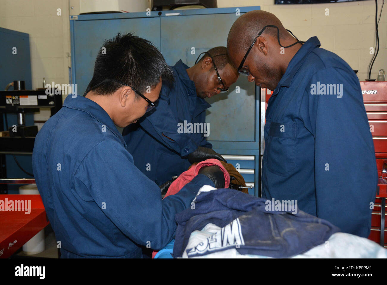 STENNIS SPACE CENTER, Miss. – International students participating in the Outboard Motor Maintenance and Overhaul course complete practical exercises at Naval Small Craft Instruction and Technical Training School facilities on the John C. Stennis Space Center in Mississippi. Class 18-1 featured students from Cameroon, Chad and Niger in support of the Lake Chad Basin Initiative, a regional training iteration focused on transregional threats, increasing partner nation abilities and interoperability.  NAVSCIATTS currently offers 21 courses of instruction, including its Partner Nation Instructor P Stock Photo