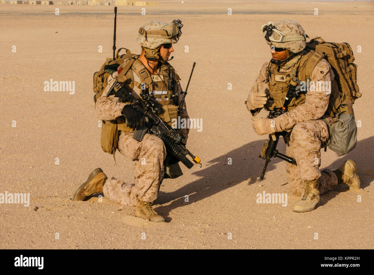 U S Marine 1st Lt Austin Pile And Staff Sgt Robert Mann 2nd Battalion 7th Marine Regiment Special Purpose Marine Air Ground Task Force Crisis Response Central Command Discuss Tactical Moves During
