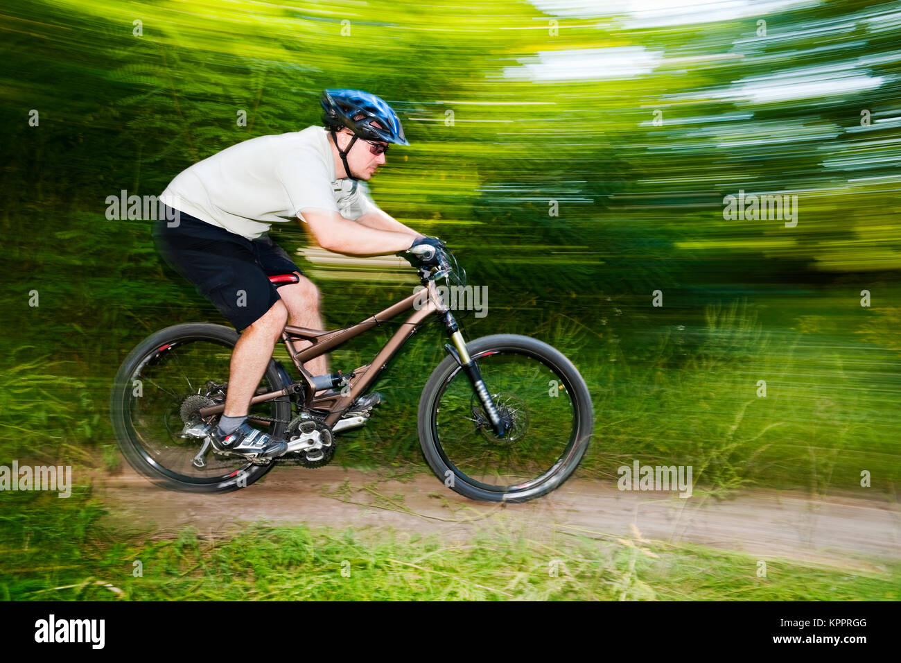 Professional mountain biker riding fast hi-res stock photography and ...