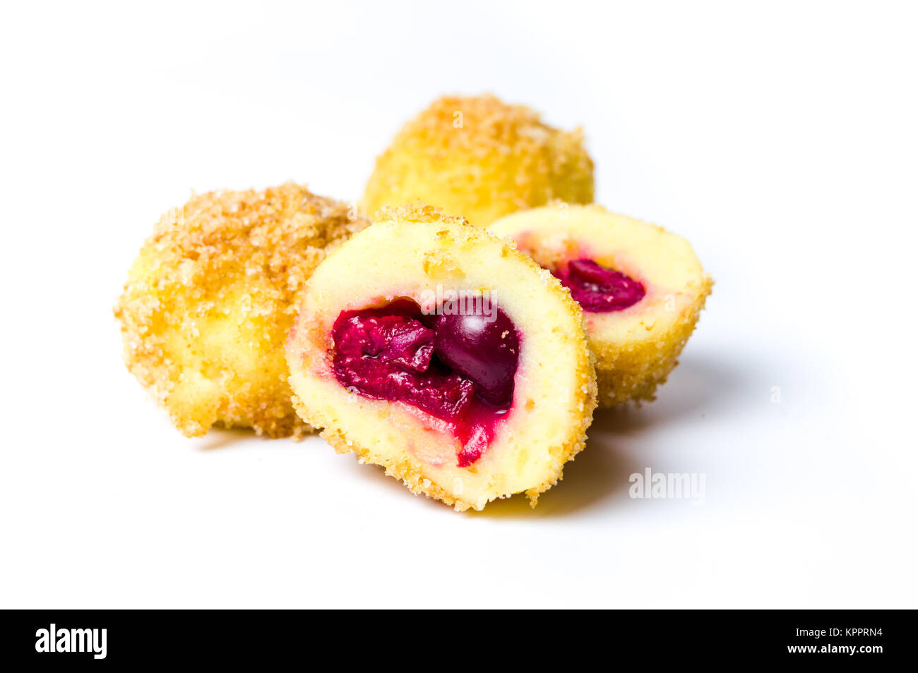 Homemade bread crumb dumplings with cherry fruit isolated Stock Photo