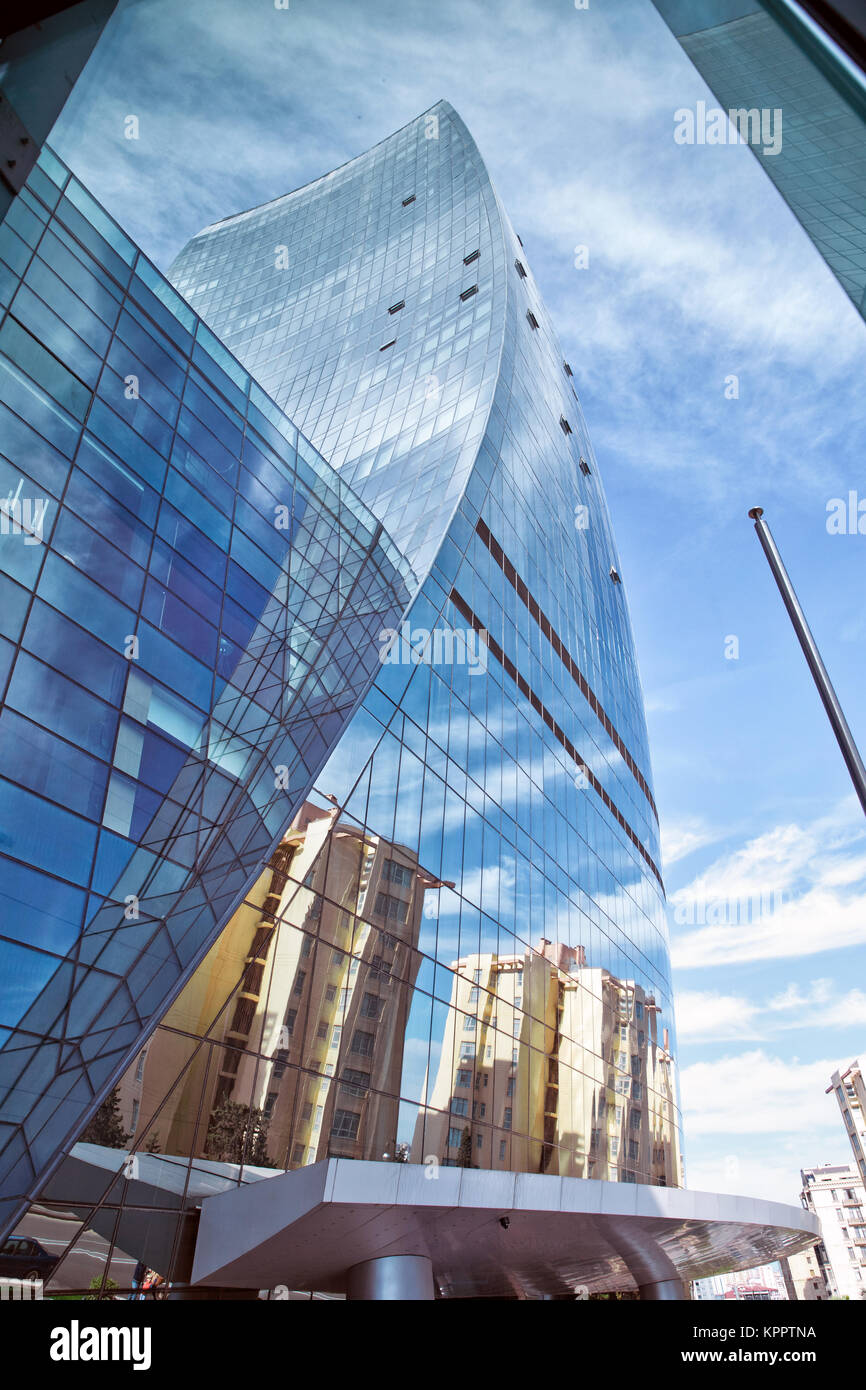 Clouds Reflected in Windows of Modern Office Building Stock Photo - Alamy