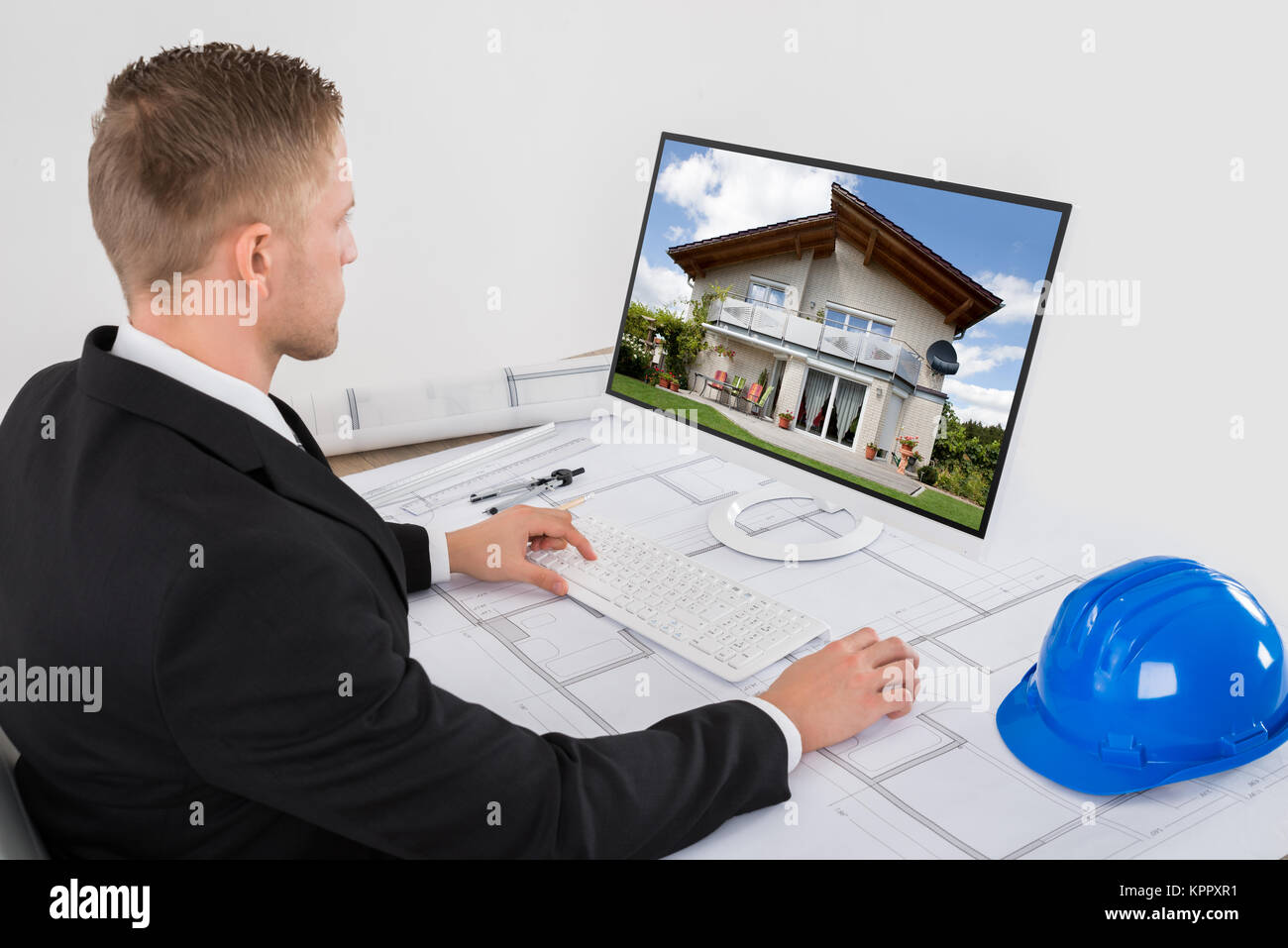 Architect Working On His Computer In Office Stock Photo - Alamy