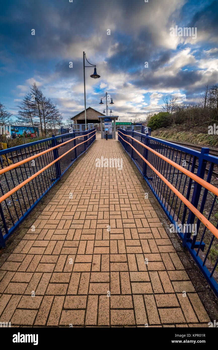 Train Footpath pattern paved foot path leading too a train station Stock Photo - Alamy
