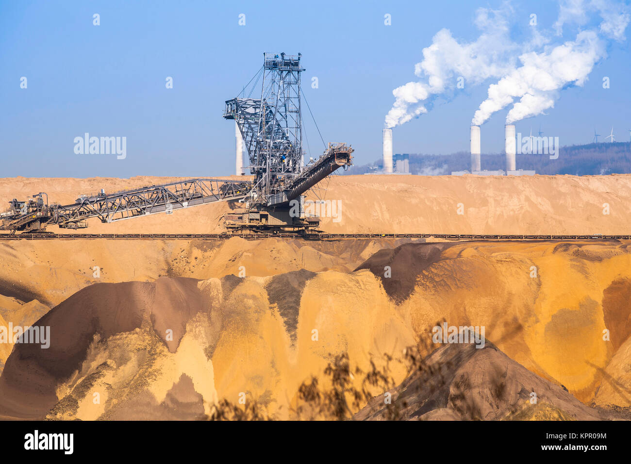 Germany, brown coal opencast mining Garzweiler near Juechen, in the background the power plant Frimmersdorf.  Deutschland, Braunkohletagebau Garzweile Stock Photo