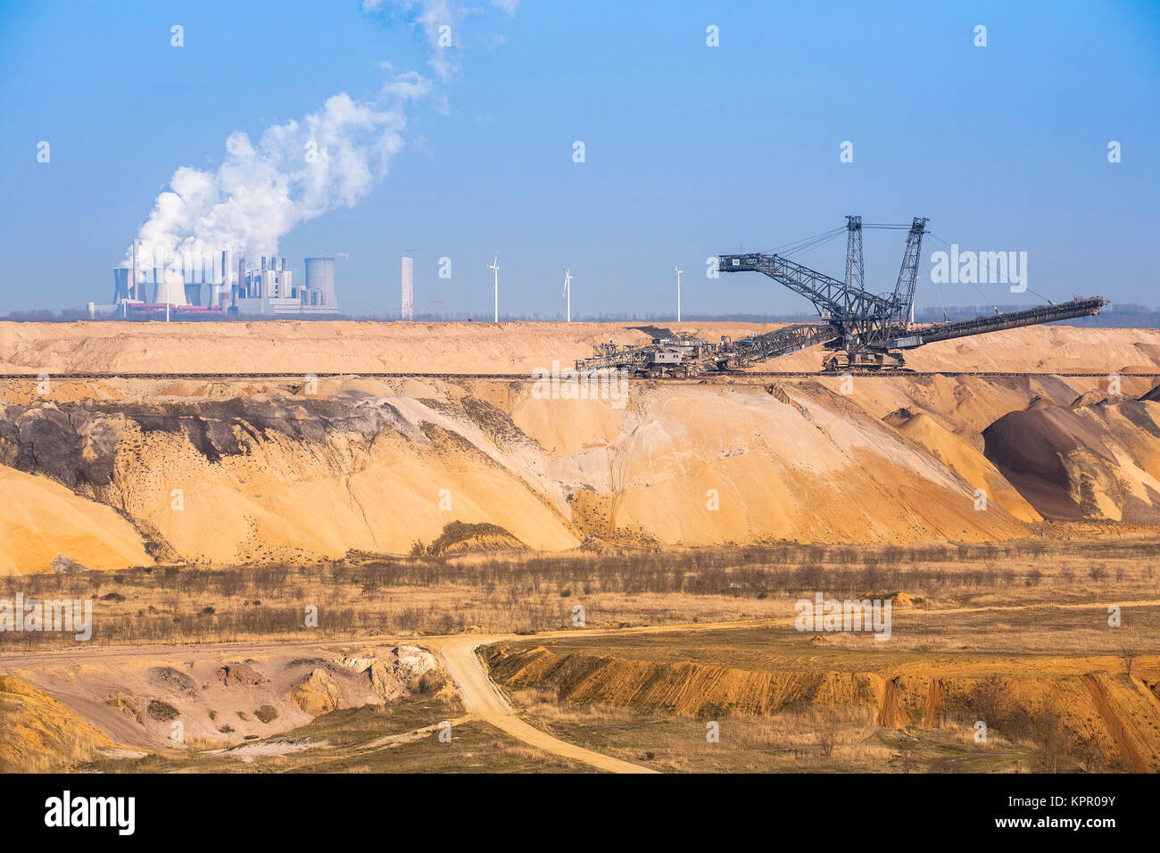 Germany, brown coal opencast mining Garzweiler near Juechen, in the background the power plant Neurath.  Deutschland, Braunkohletagebau Garzweiler bei Stock Photo