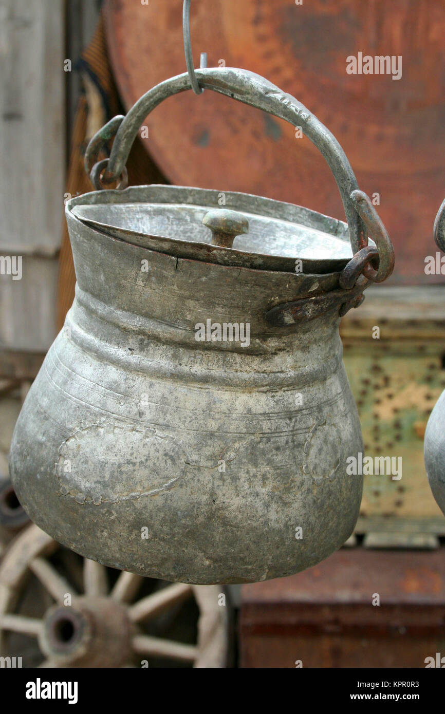 An antique pot hanging on display at a souvenir shop Stock Photo