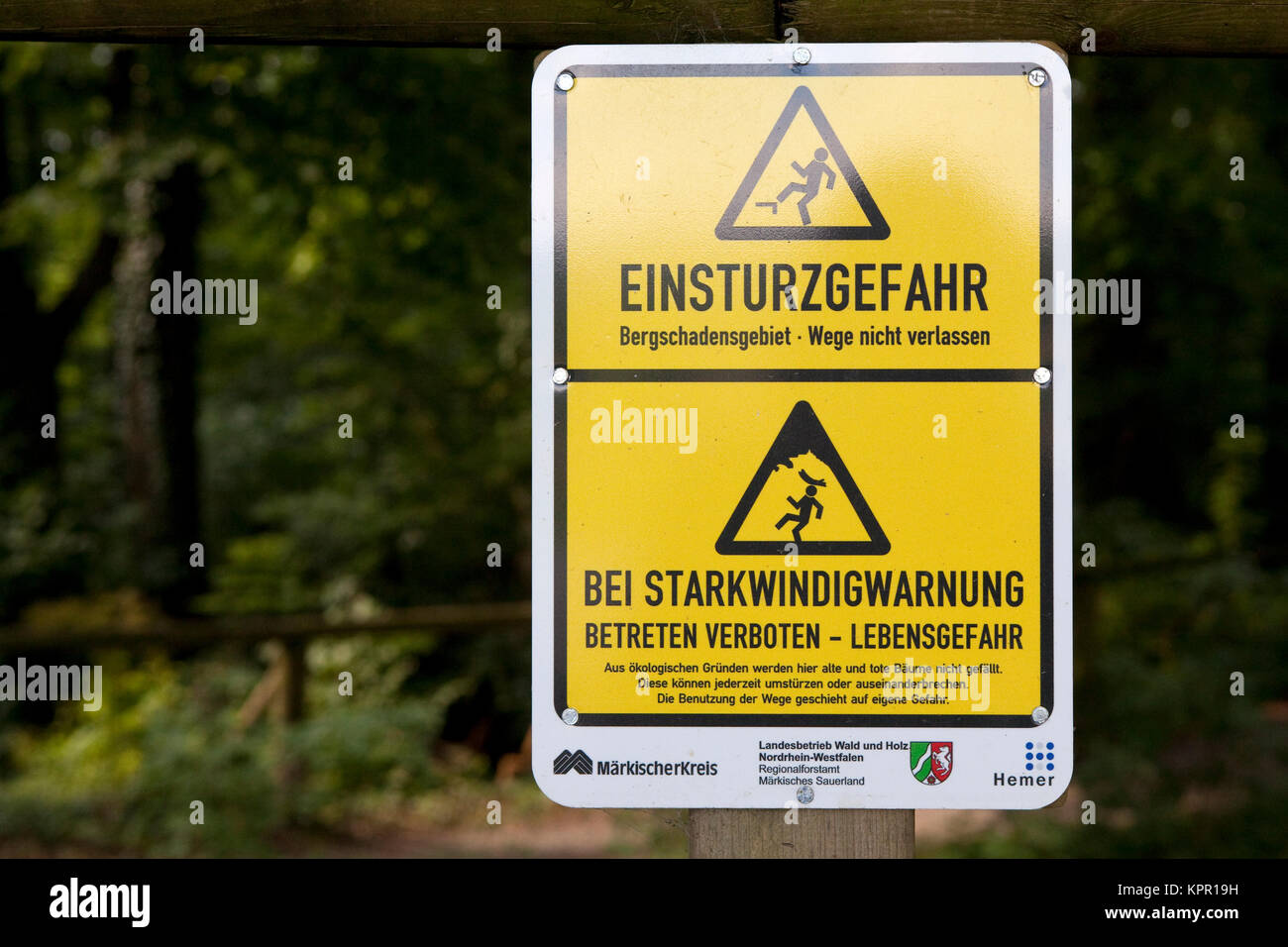 Europe, Germany, Sauerland region, the Hemer Felsenmeer, stone run, warning sign against collapse and strong wind.  Europa, Deutschland, Sauerland, da Stock Photo