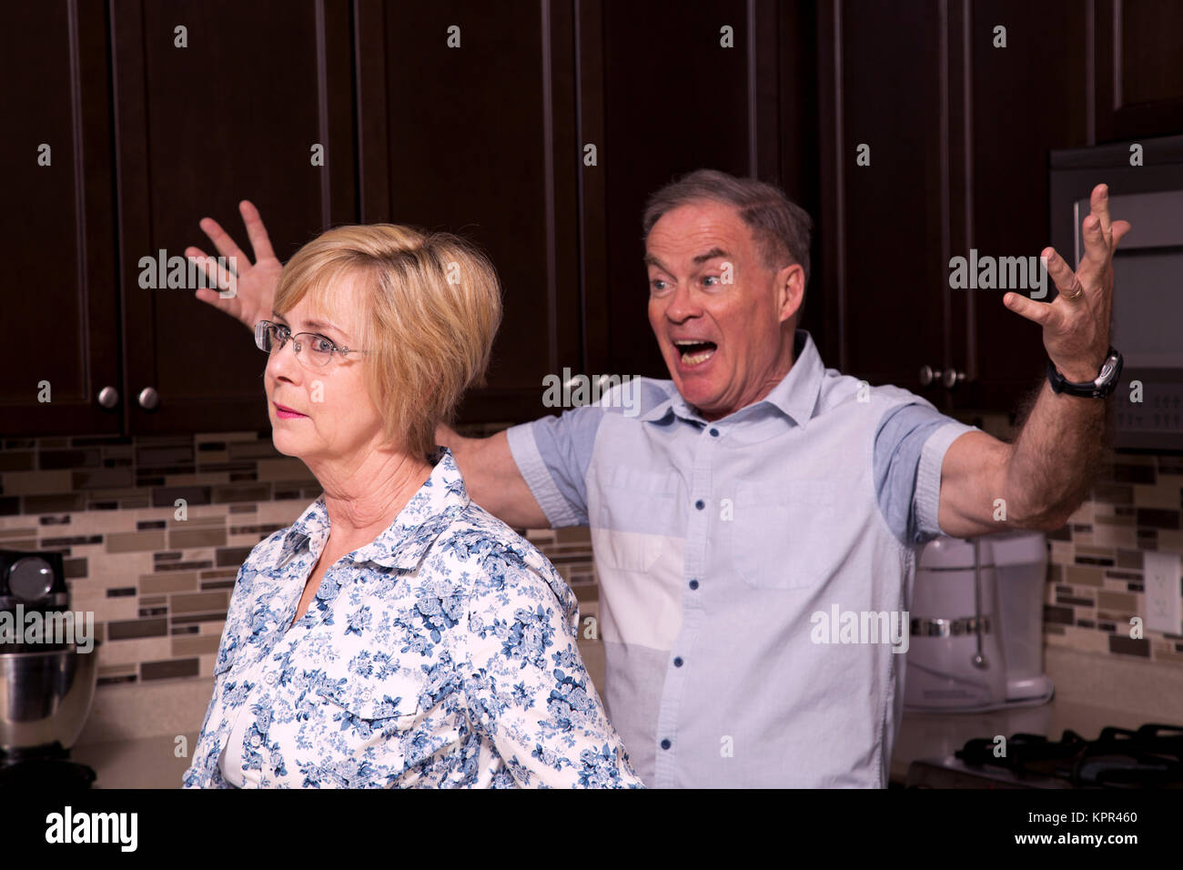 retired couple in the kitchen Stock Photo - Alamy