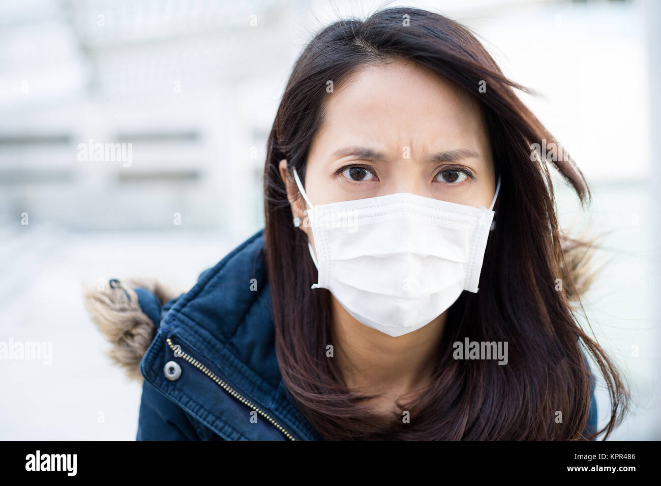 Woman wearing face mask Stock Photo Alamy