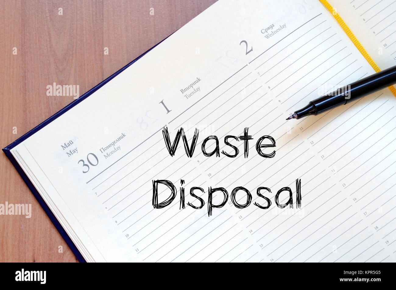 Waste disposal write on notebook Stock Photo