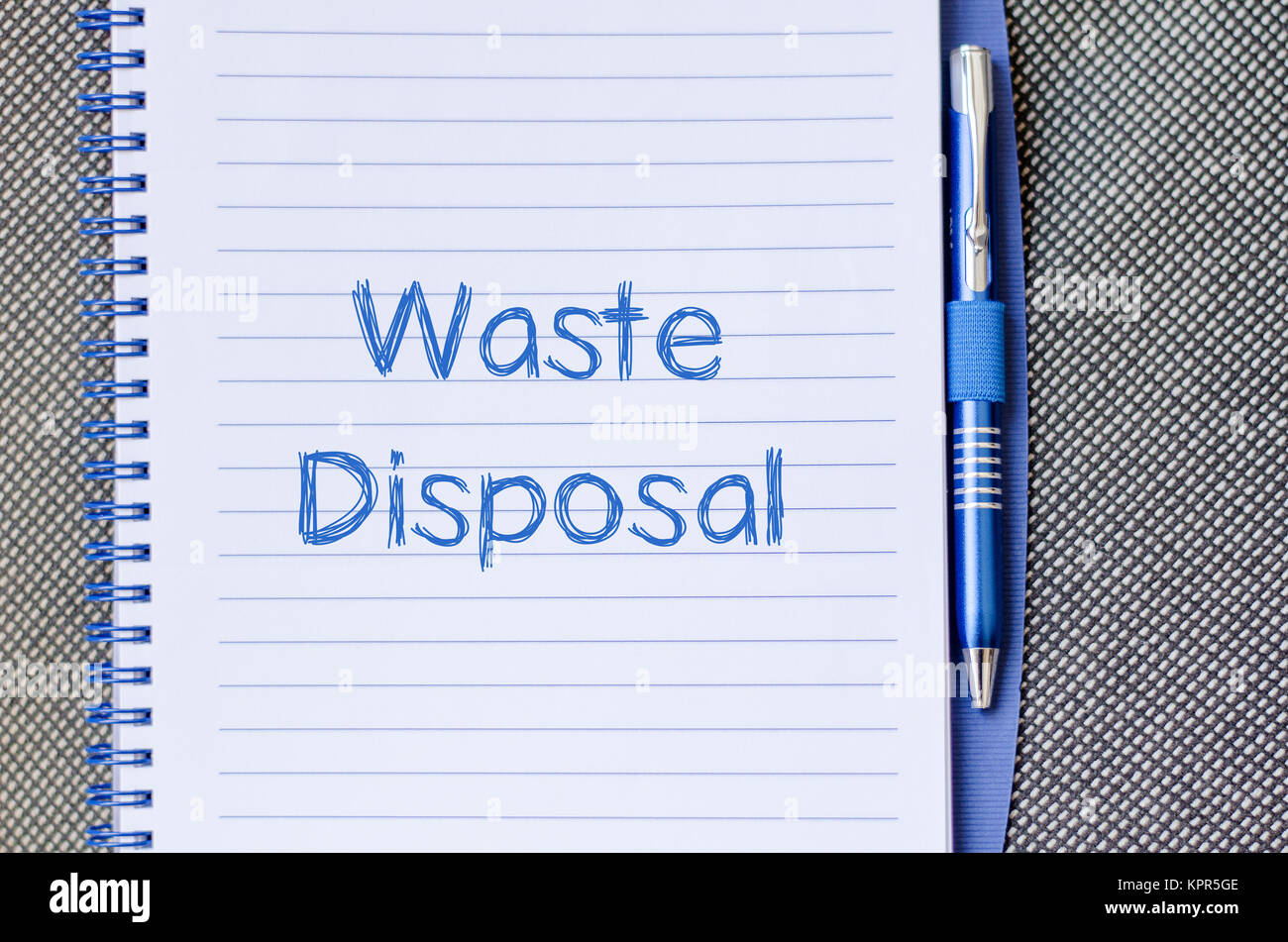 Waste disposal write on notebook Stock Photo