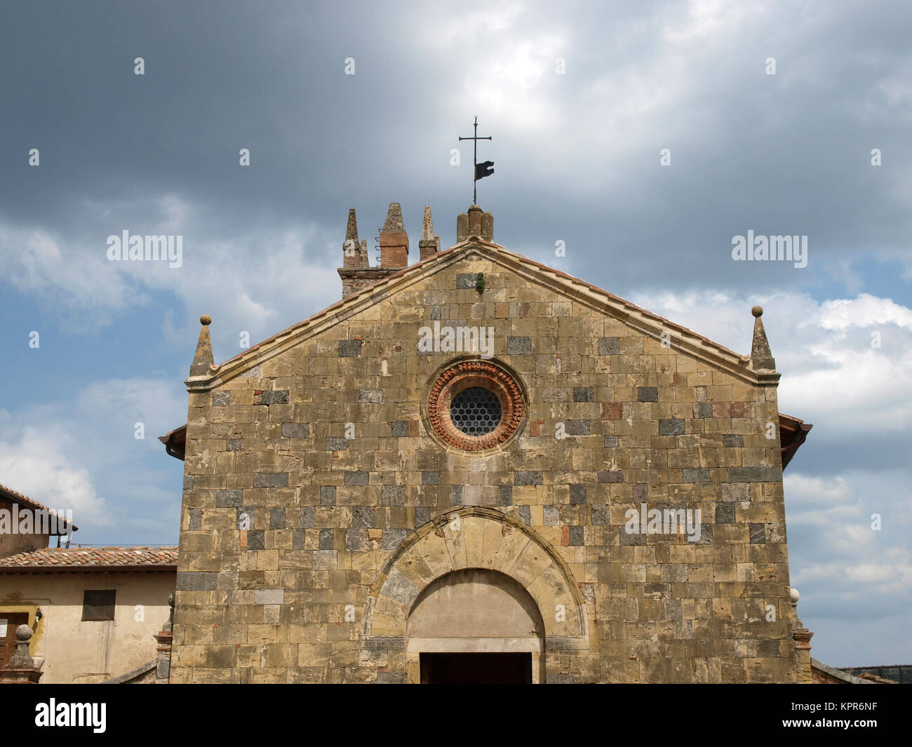 Monteriggioni - Santa Maria church. This church located in Piazza Roma, was built in the 13th century Stock Photo