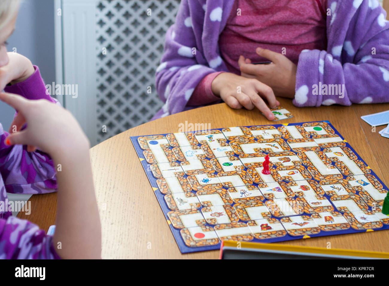 Children kids playing Labyrinth board game, family fun, board games