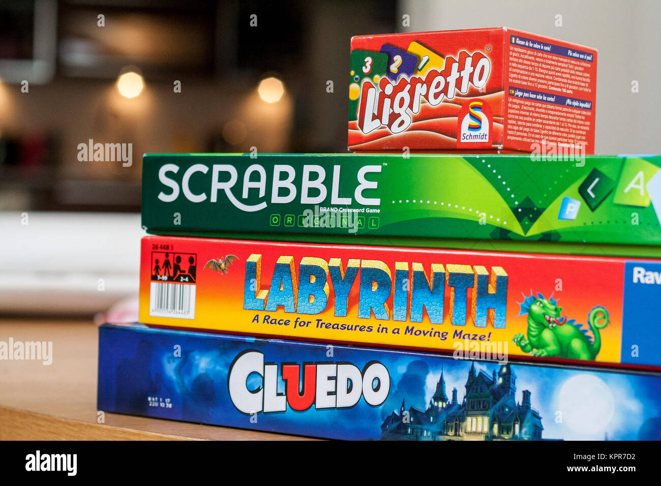 Children, kids adults family board games, Cluedo, Labyrinth, scrabble, ligretto, board game children Stock Photo