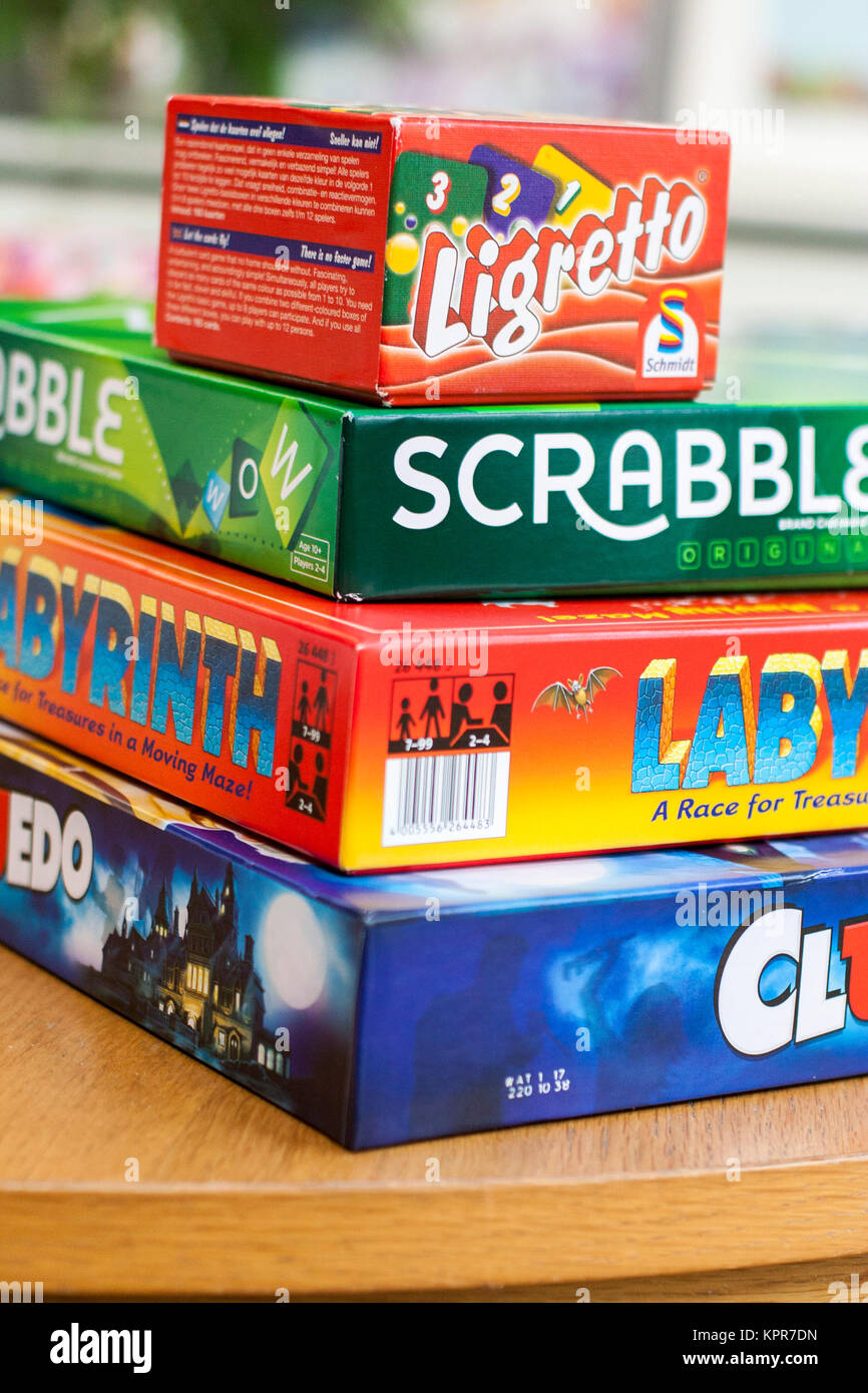 Children, kids adults family board games, Cluedo, Labyrinth, scrabble, ligretto, board game children Stock Photo