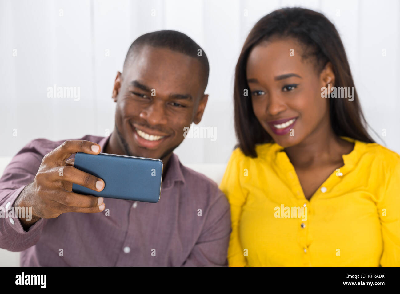 Couple Taking A Selfie With Mobile Phone Stock Photo - Alamy